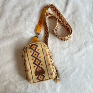 Wrangler Crossbody Bag with Card Wallet
Aztec Sling Bag Yellow NEW